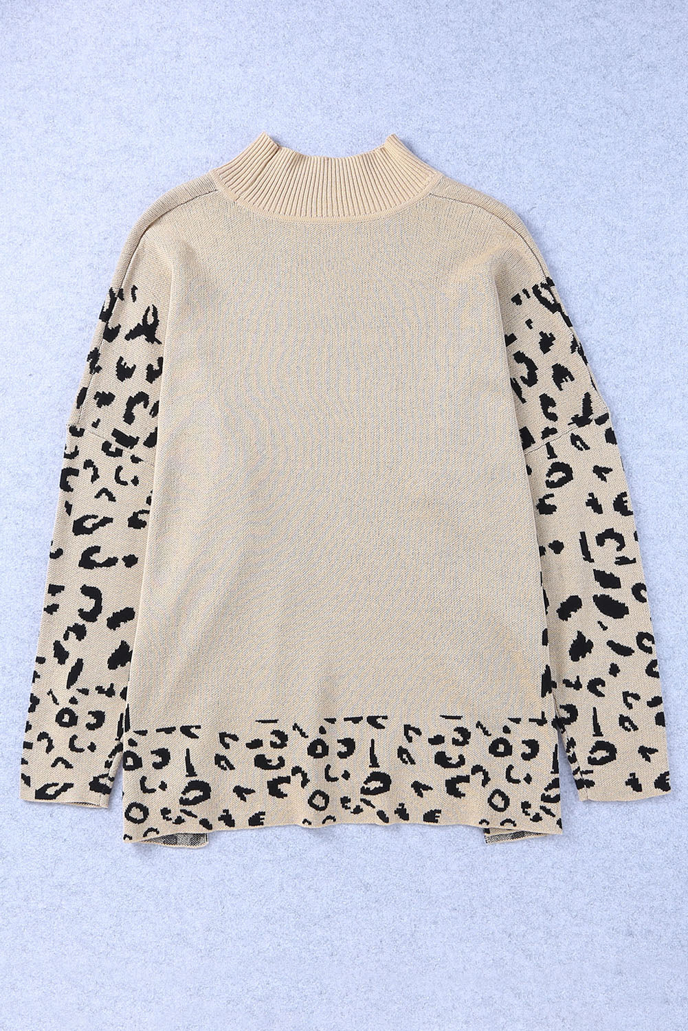 Khaki leopard print oversized sweater with high neck and side slit, made by ModestAndDevoted, featuring a cozy acrylic-cotton blend.