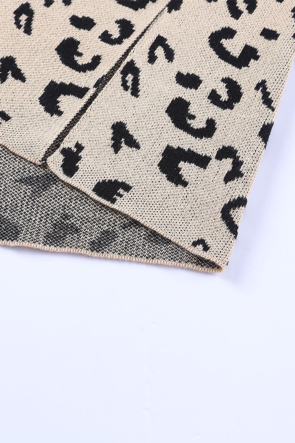 Khaki leopard print oversized sweater with high neck and side slit, made of acrylic and cotton, by ModestAndDevoted.