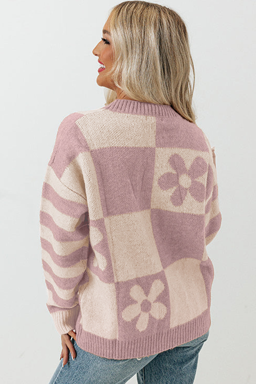 ModestAndDevoted orchid petal checkered floral print striped sleeve sweater, cozy polyester knit with vibrant floral design.