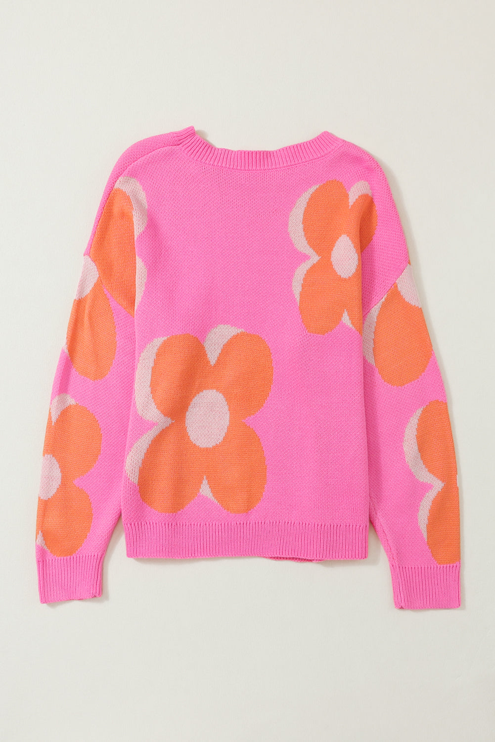 Red flower pattern slouchy sweater from ModestAndDevoted, cozy knit sweater with a relaxed fit and vibrant floral design.