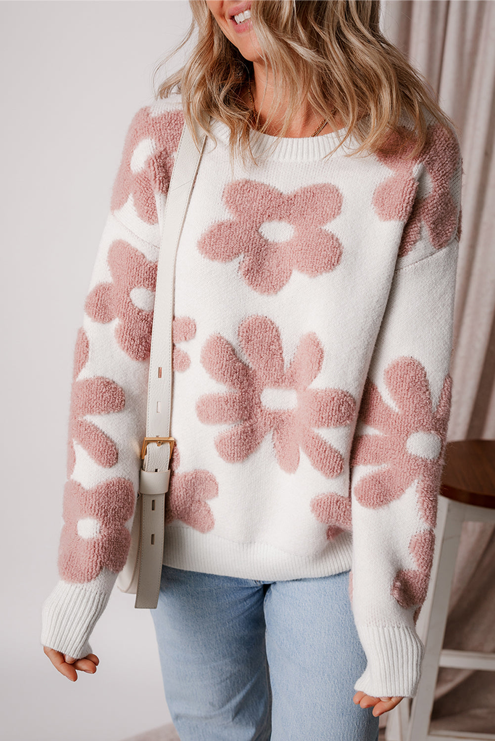 White textured flower drop shoulder loose sweater by ModestAndDevoted, featuring a relaxed fit and floral knit pattern.