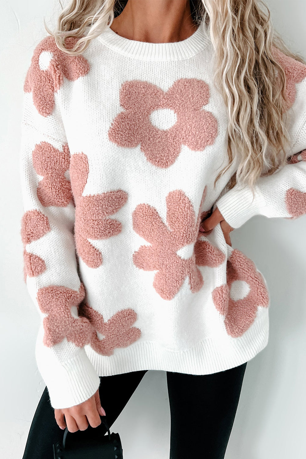White textured flower drop shoulder loose sweater from ModestAndDevoted, featuring a relaxed fit and floral knit pattern.