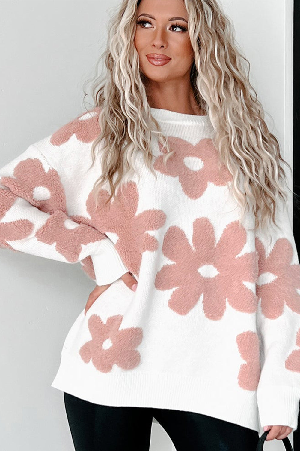 White textured flower drop shoulder loose sweater by ModestAndDevoted, featuring a soft knit design and relaxed fit.