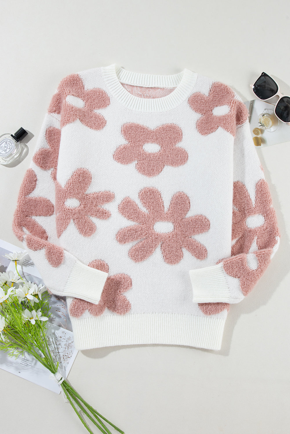White textured flower drop shoulder loose sweater from ModestAndDevoted, featuring a relaxed fit and floral knit design.
