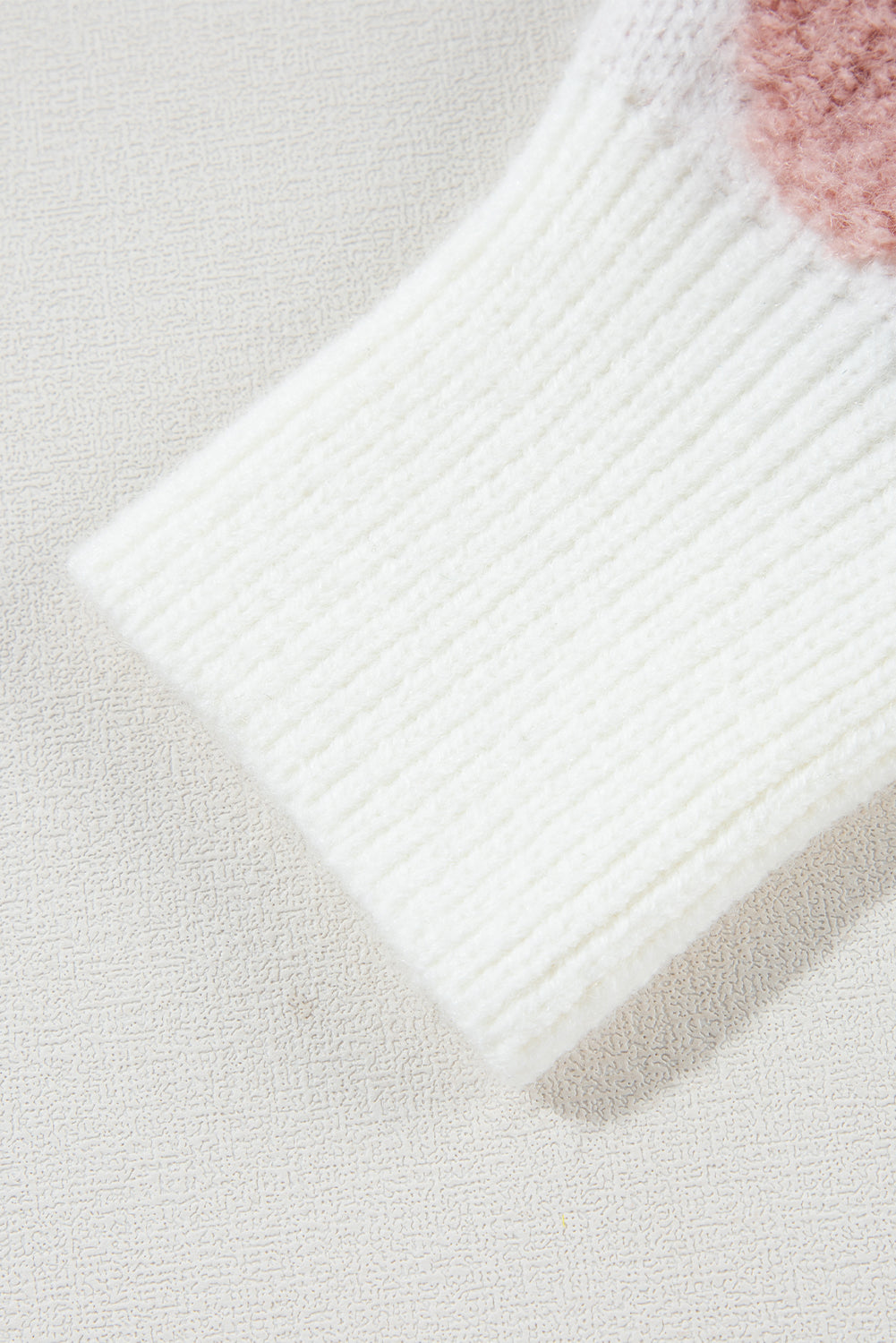 White textured flower drop shoulder loose sweater from ModestAndDevoted, featuring a cozy knit design and relaxed fit.