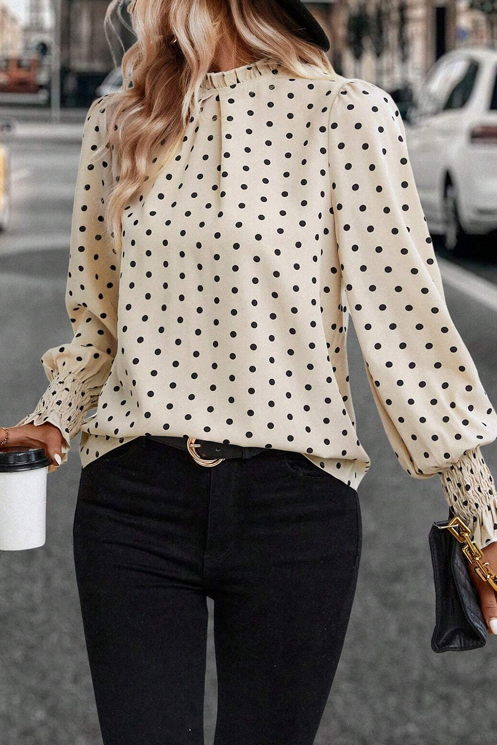 Apricot polka dot print blouse with frilled collar and lantern sleeves from ModestAndDevoted, made of lightweight polyester fabric.