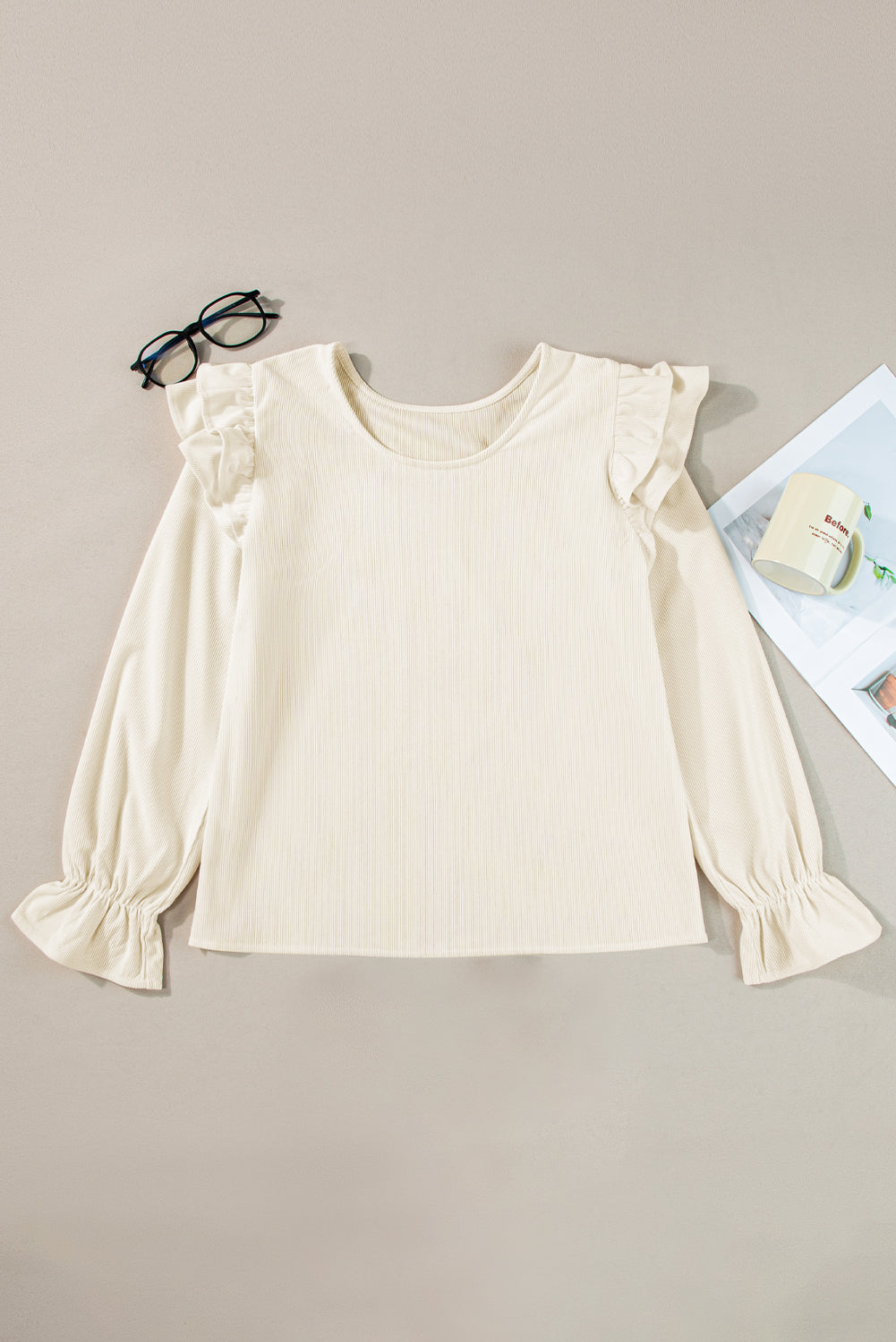 Beige ruffled flounce sleeve corduroy blouse by ModestAndDevoted, featuring a stylish design with soft textured fabric.