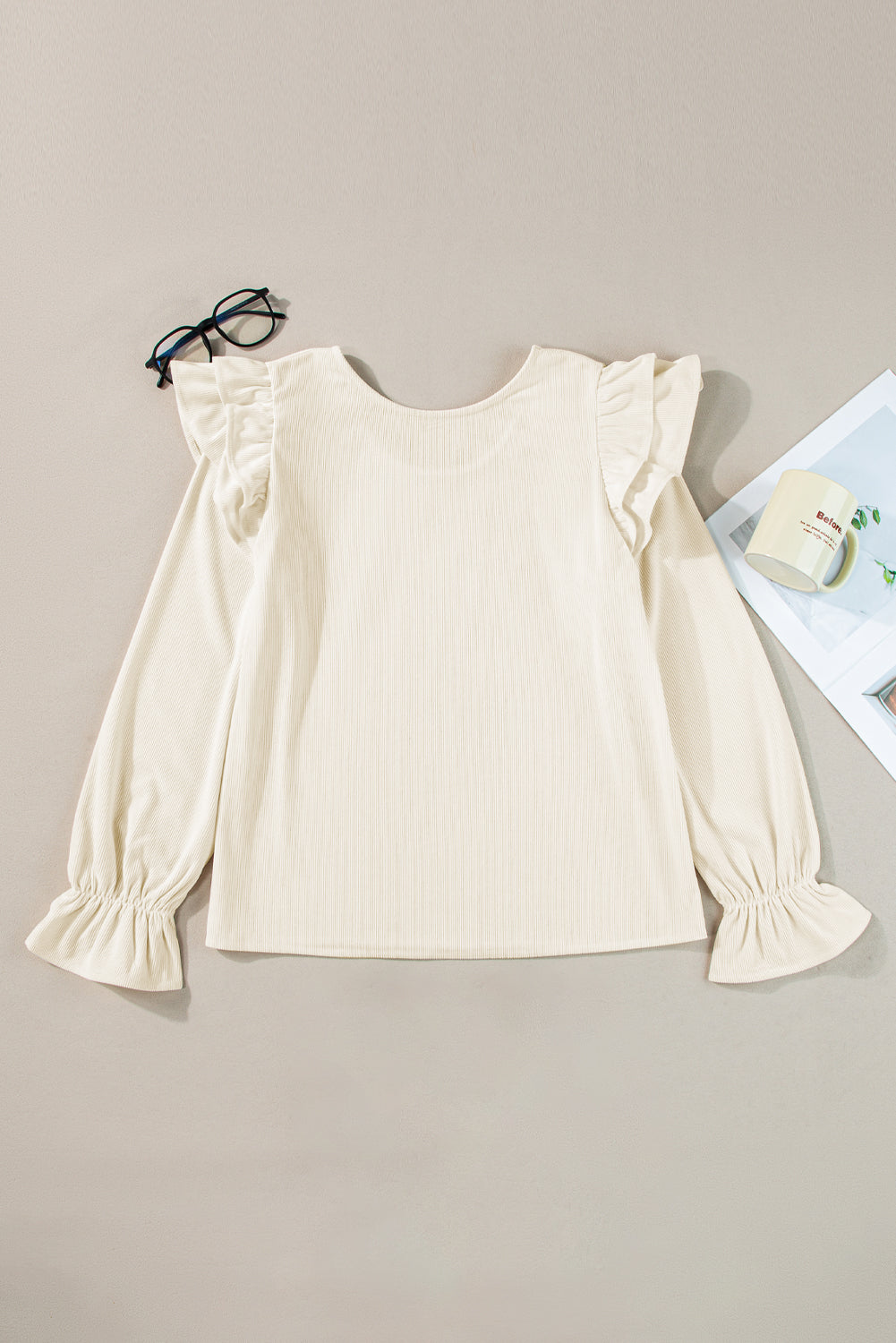 Beige corduroy blouse with ruffled flounce sleeves, from ModestAndDevoted, featuring a stylish and comfortable top for casual or dressy wear.