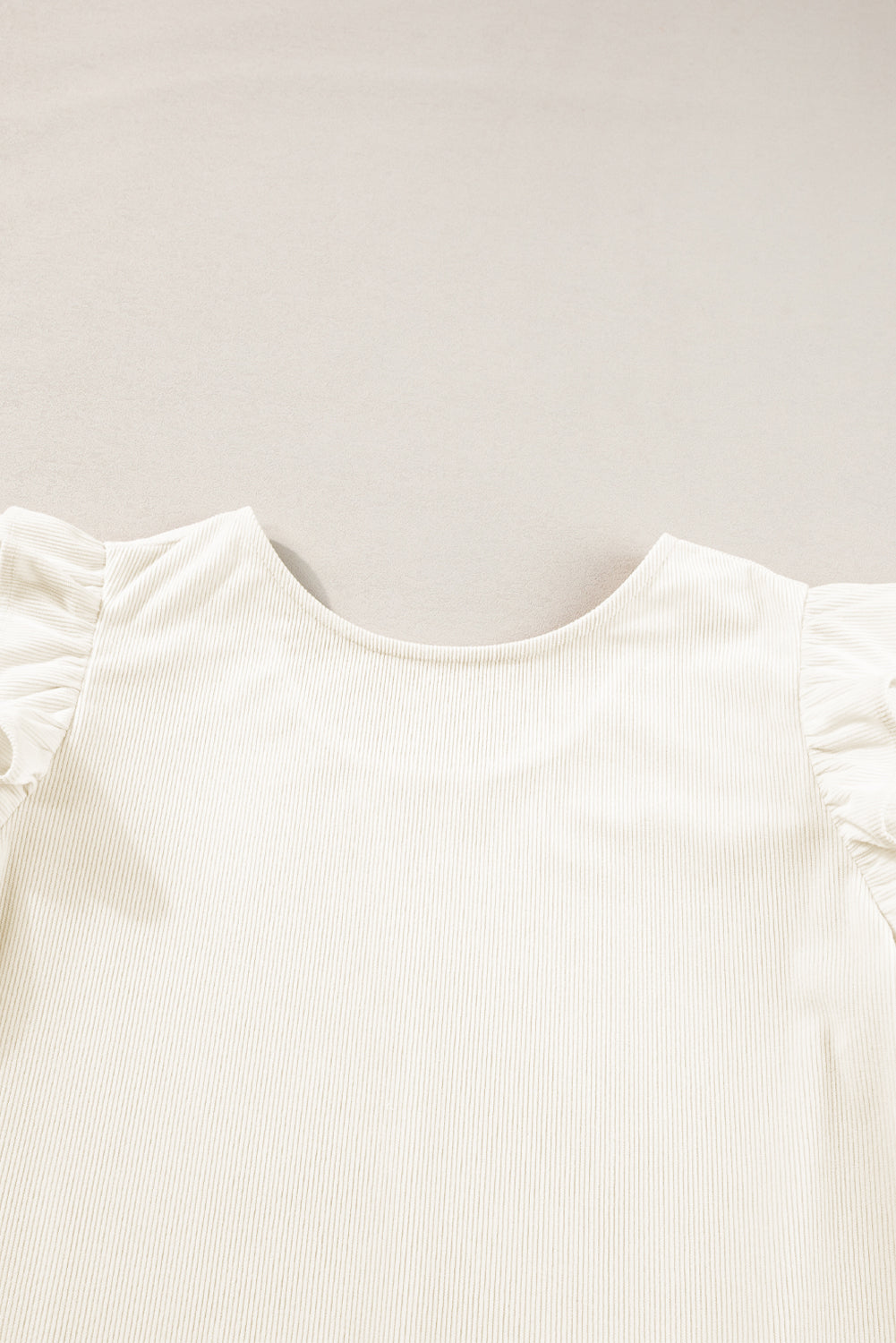 Beige corduroy blouse with ruffled flounce sleeves from ModestAndDevoted, stylish top for casual or dressy occasions.