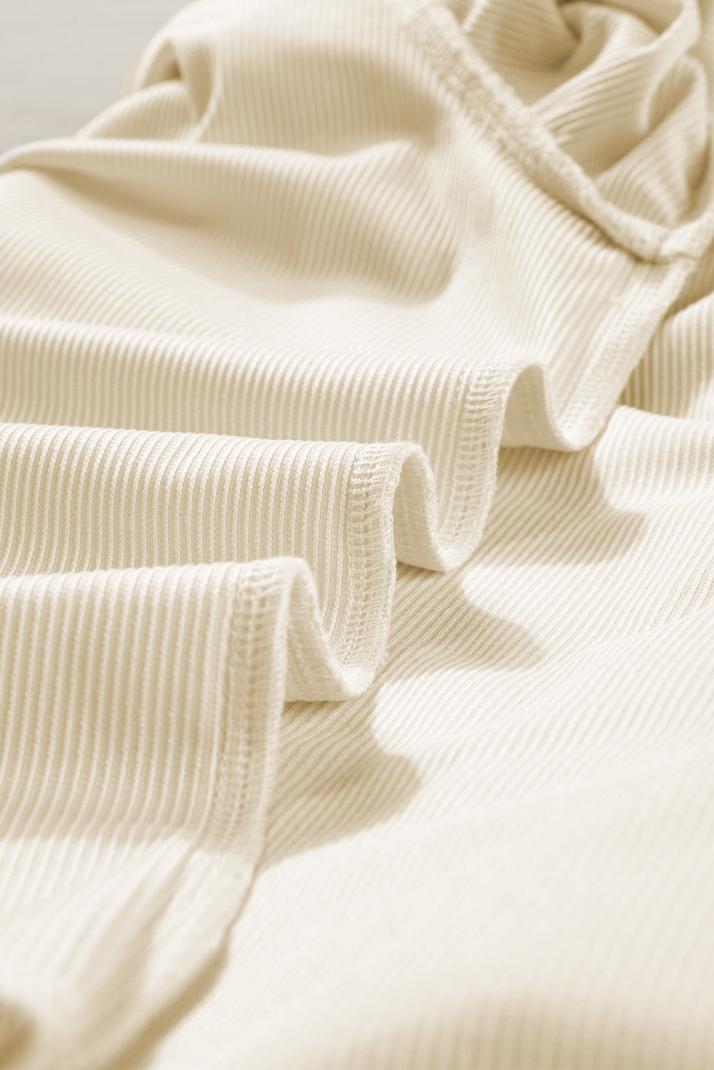 Beige corduroy blouse with ruffled flounce sleeves from ModestAndDevoted, featuring a stylish and comfortable top design.