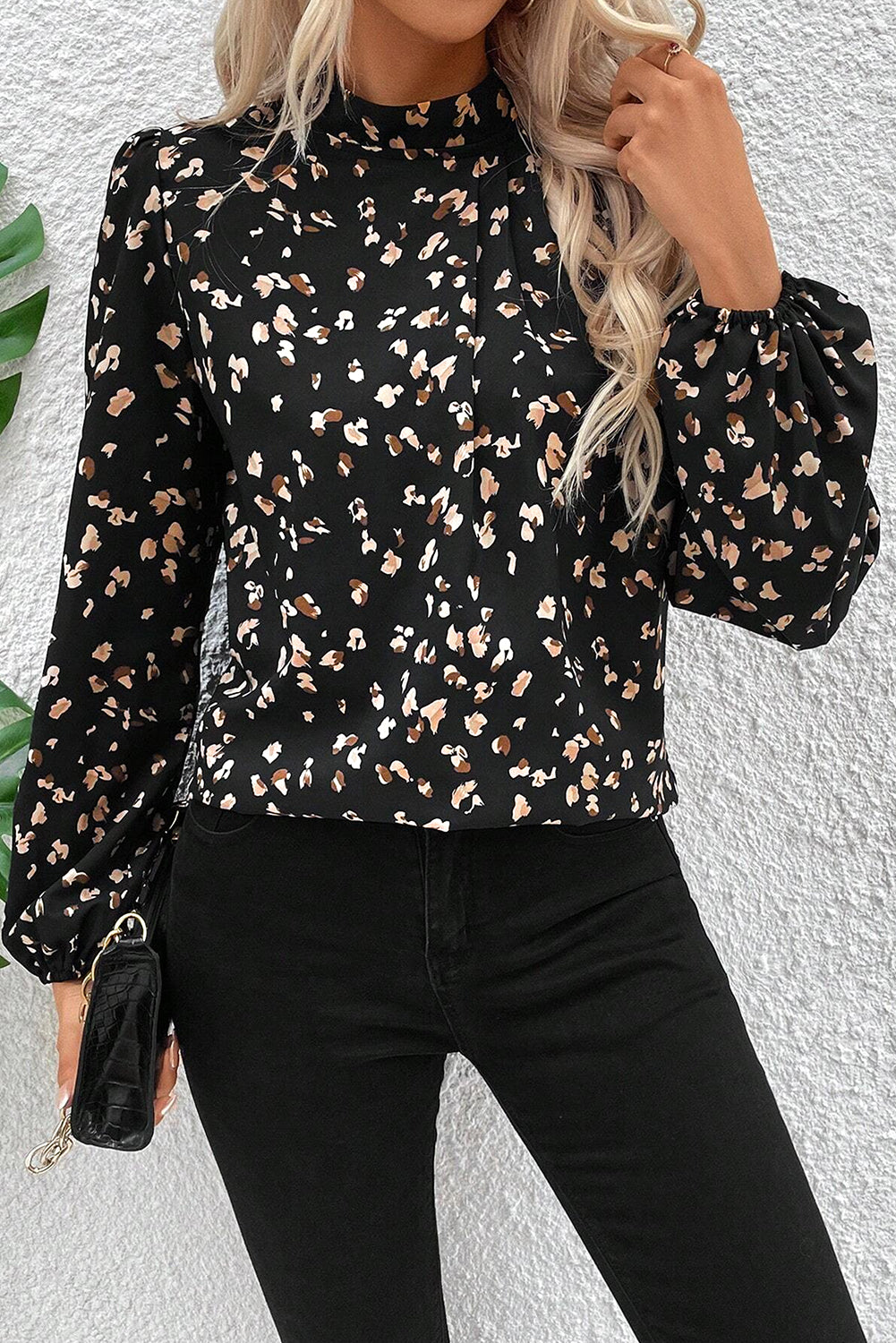 Black leopard print lantern sleeve mock neck blouse with pleated design from ModestAndDevoted, featuring a stylish top for women.