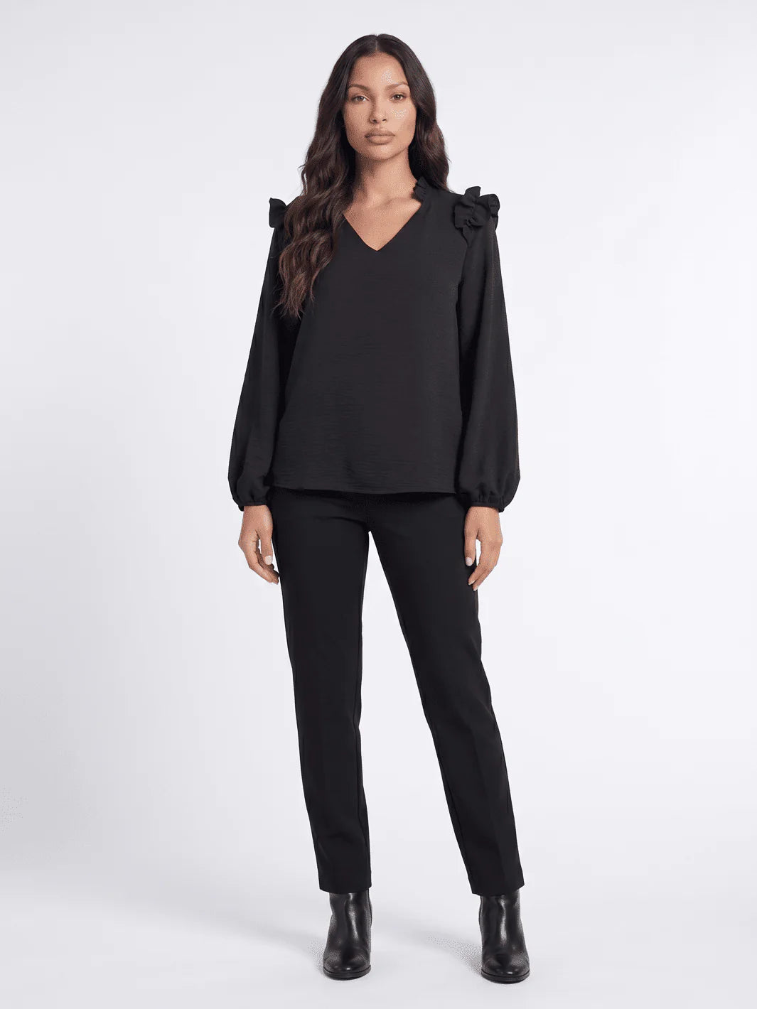 Long sleeve V-neck blouse with ruffle shoulders in assorted colors, from ModestAndDevoted, featuring a stylish and feminine design.