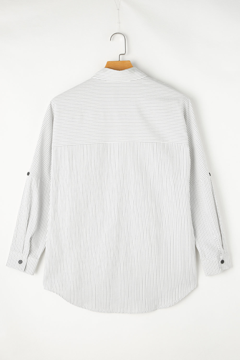 Black stripe roll-tab sleeve long shirt with pockets from ModestAndDevoted, made of polyester and cotton, casual blouse or top.