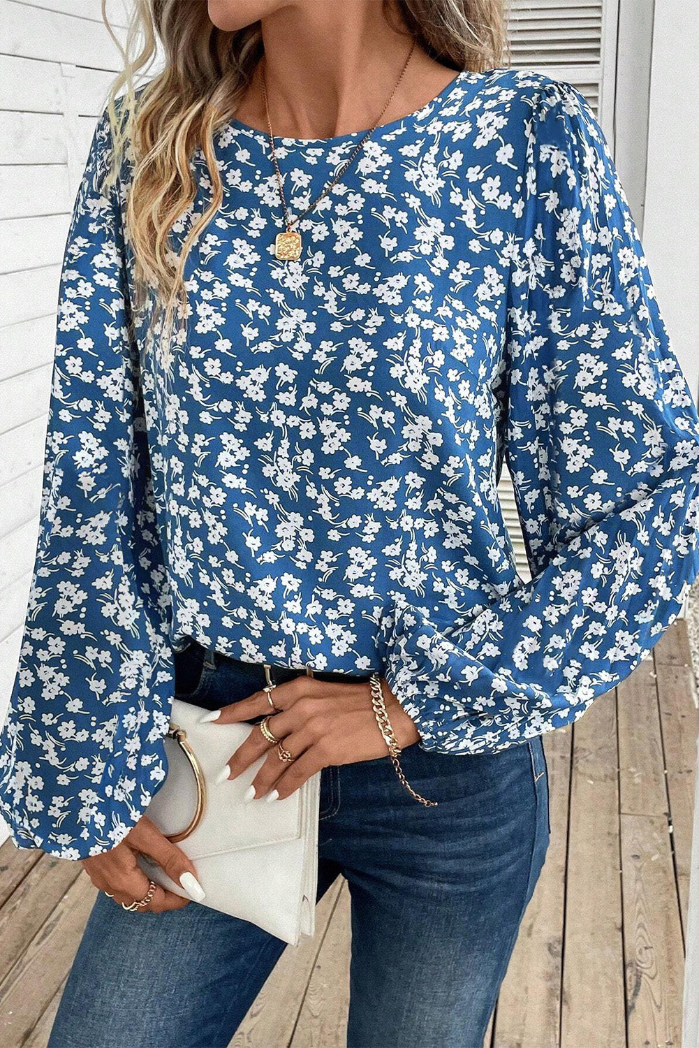 Blue Ditsy Floral Print Lantern Sleeve Blouse from ModestAndDevoted, featuring a lightweight polyester fabric and charming floral pattern.