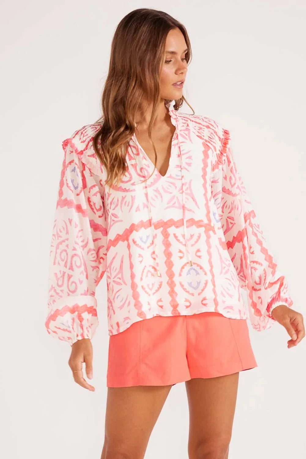 Desert Flower vintage print blouse by ModestAndDevoted with smocked poet collar and billowy blouson sleeves, made of lightweight polyester.