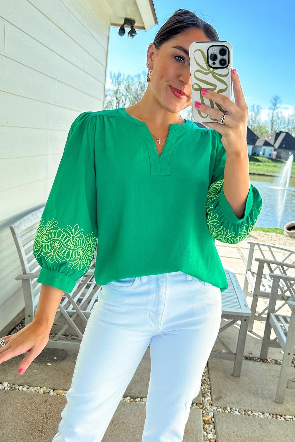 Green floral embroidered blouse by ModestAndDevoted with 3/4 sleeves, notched V-neck, elegant design, made of polyester.