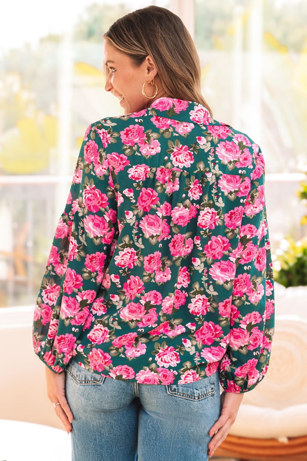 Green floral printed blouse from ModestAndDevoted with puff sleeves and tied collar, made of 100% polyester.