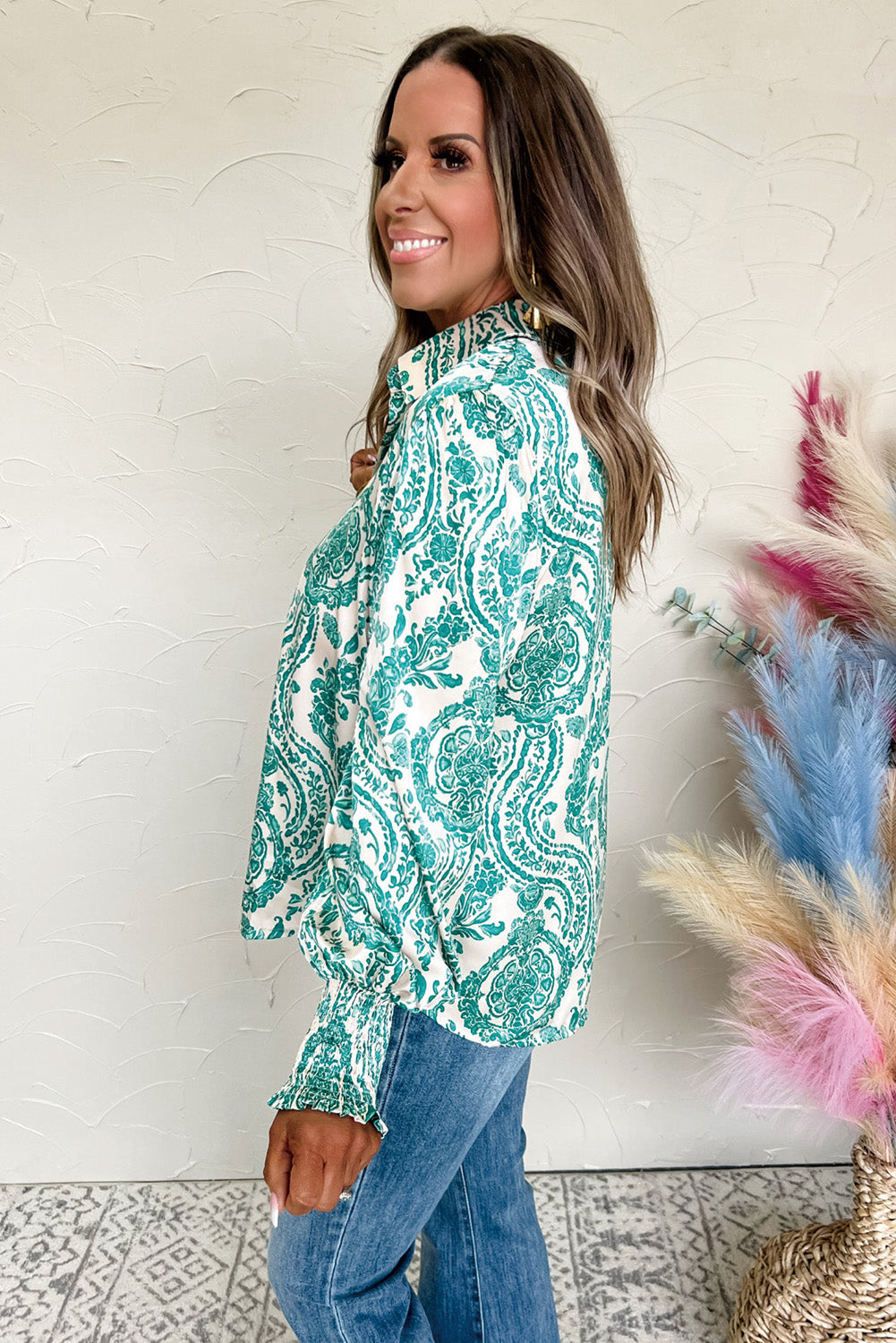 Green paisley print blouse from ModestAndDevoted with smocked cuffs and buttoned front, loose fit polyester top.