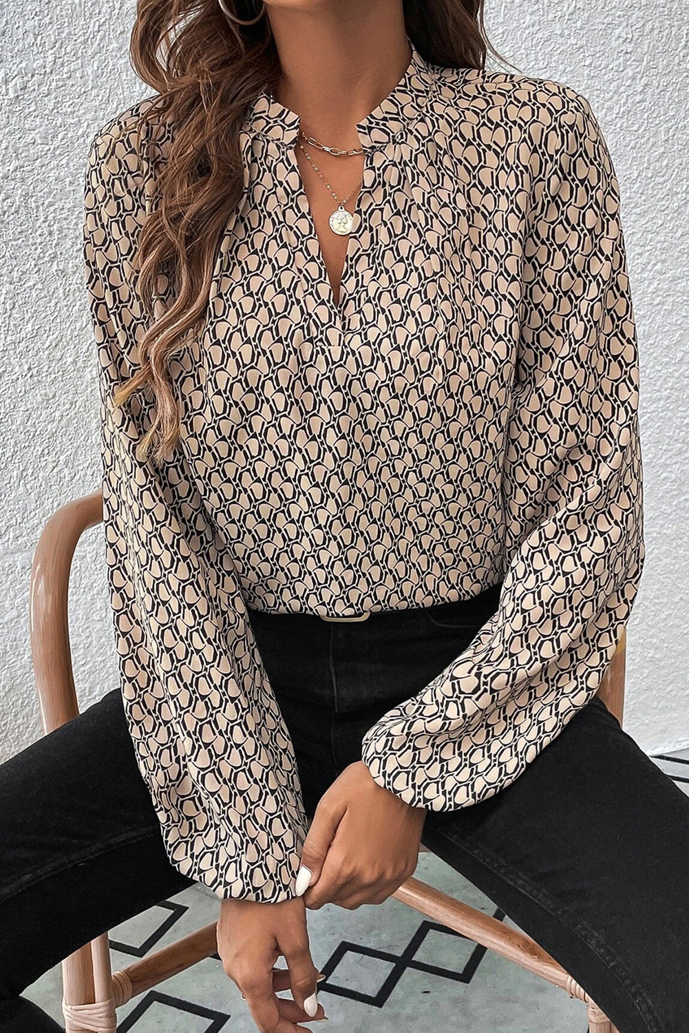 Khaki geometric print blouse with notched collar and puff sleeves, made by ModestAndDevoted, stylish top for casual or office wear.