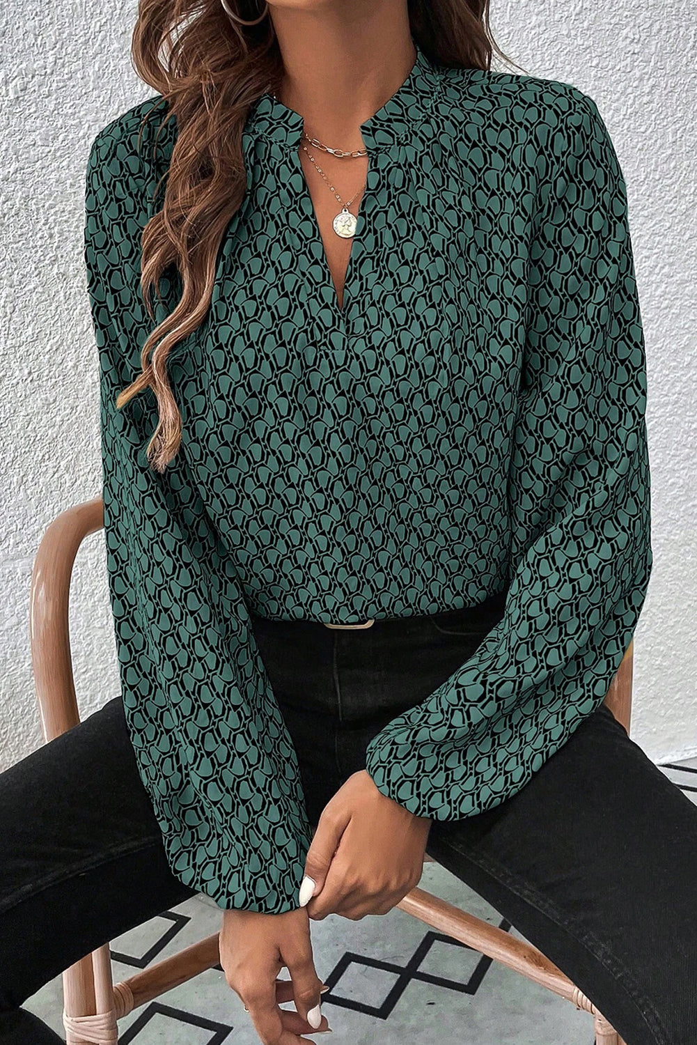 Khaki geometric print blouse with notched collar and puff sleeves from ModestAndDevoted, made of 100% polyester.