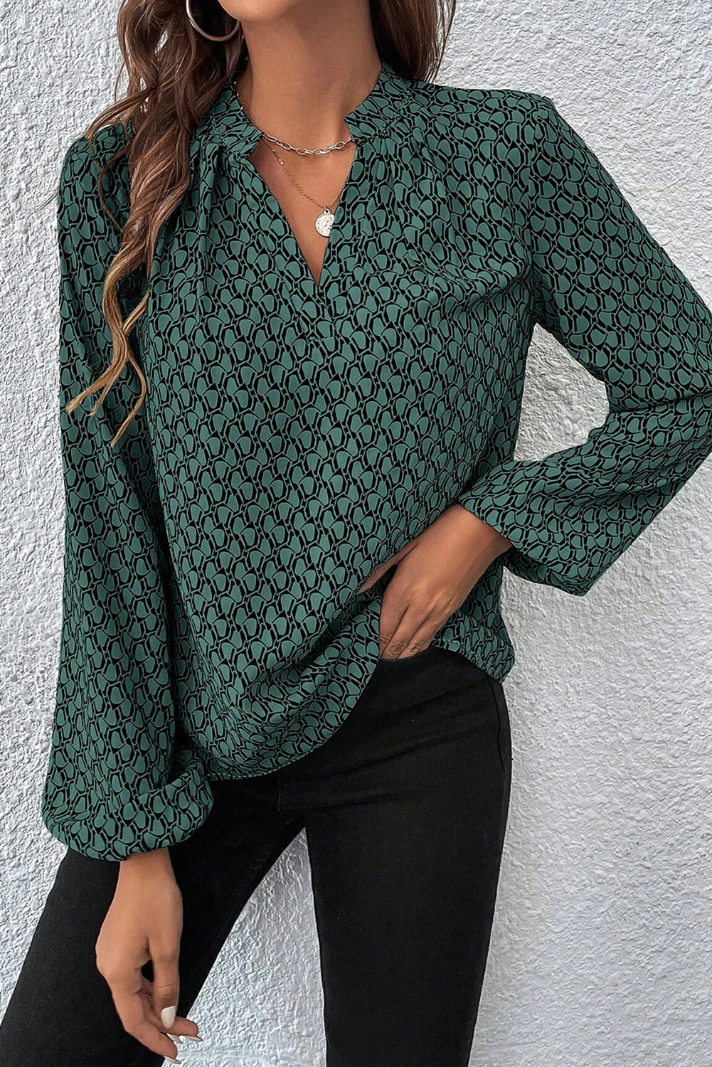 Khaki geometric print puff sleeve blouse with notched neck from ModestAndDevoted, made of lightweight polyester.