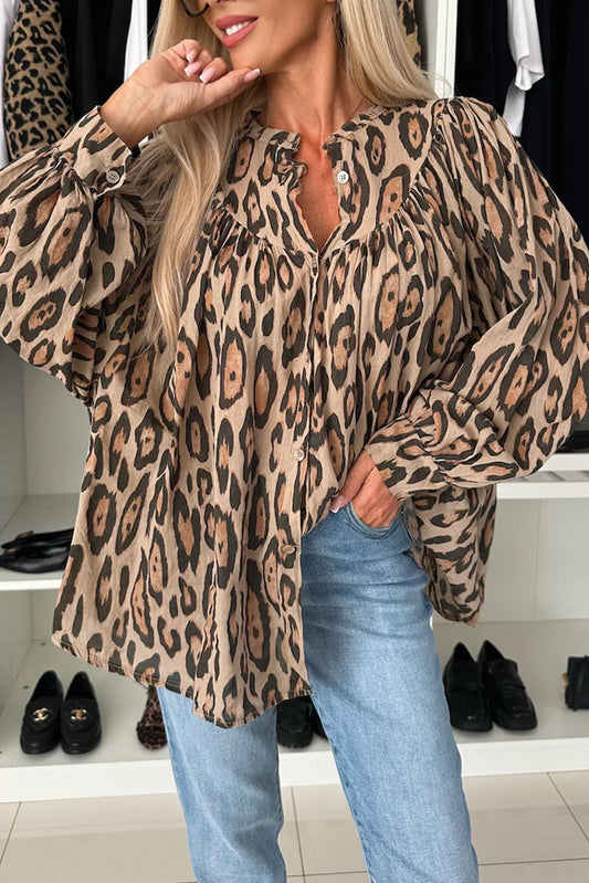 Light French beige oversized leopard print casual blouse with balloon sleeves from ModestAndDevoted, made of lightweight polyester fabric.