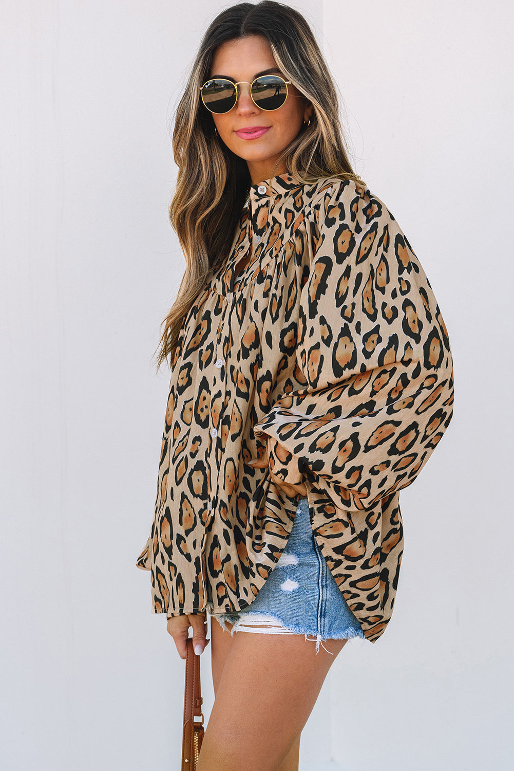 Light beige oversized leopard print casual shirt with balloon sleeves from ModestAndDevoted, made of lightweight polyester fabric.