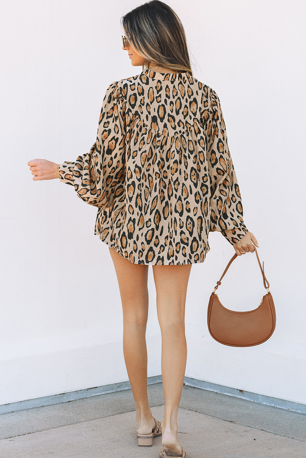 Light French beige oversized leopard print casual blouse from ModestAndDevoted with balloon sleeves, made of lightweight polyester.