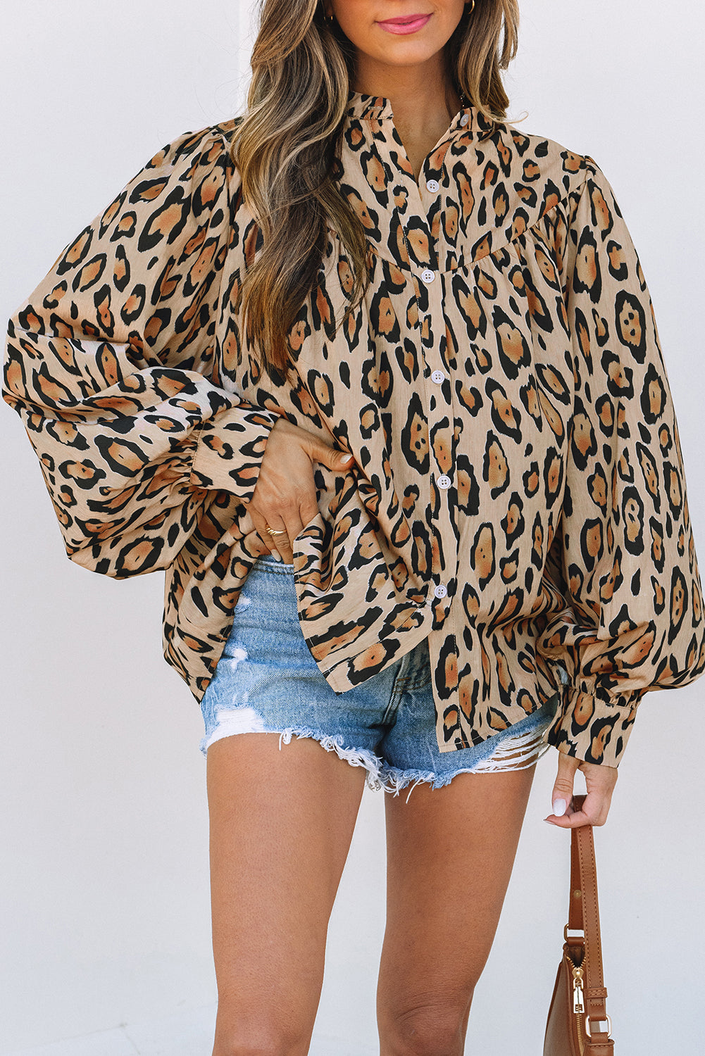Light French beige oversized leopard print casual blouse with balloon sleeves from ModestAndDevoted, made of lightweight polyester.