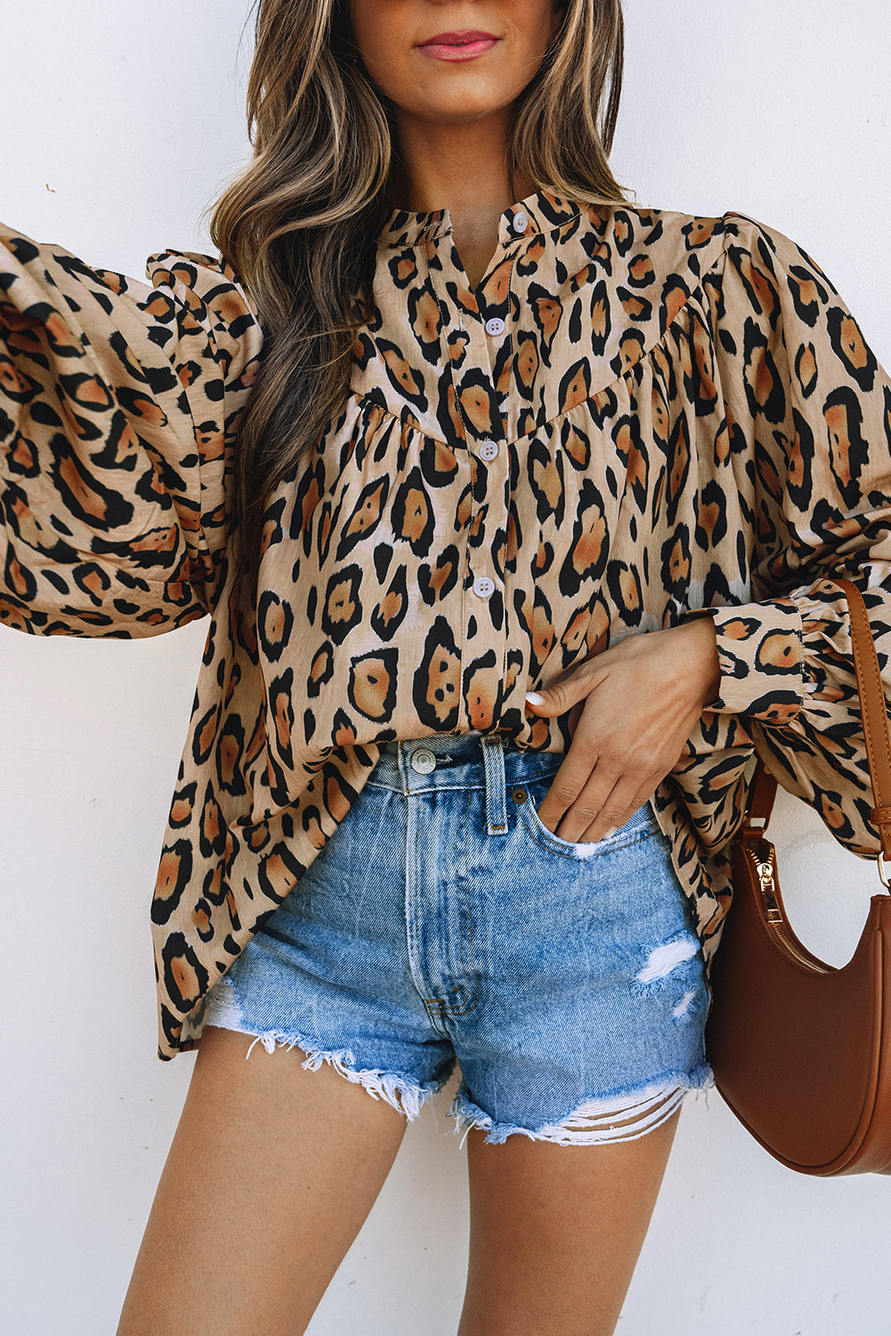 Light French beige oversized leopard print casual blouse from ModestAndDevoted with balloon sleeves and relaxed fit.