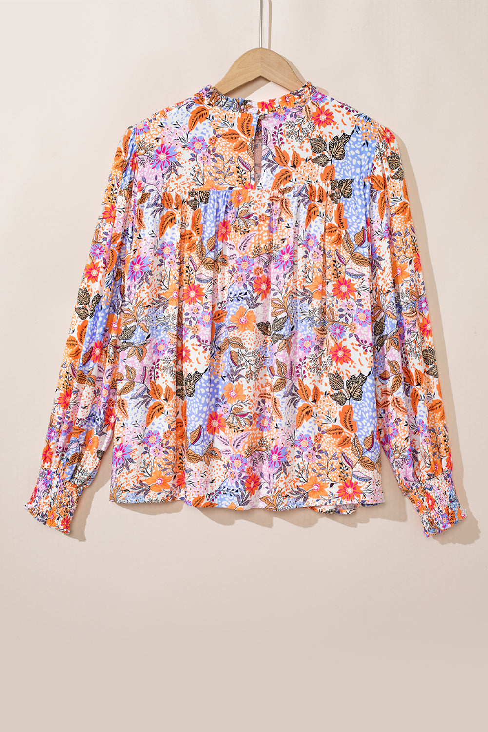 Multicolour floral bishop sleeve blouse by ModestAndDevoted with frilled round neck and lightweight viscose fabric.