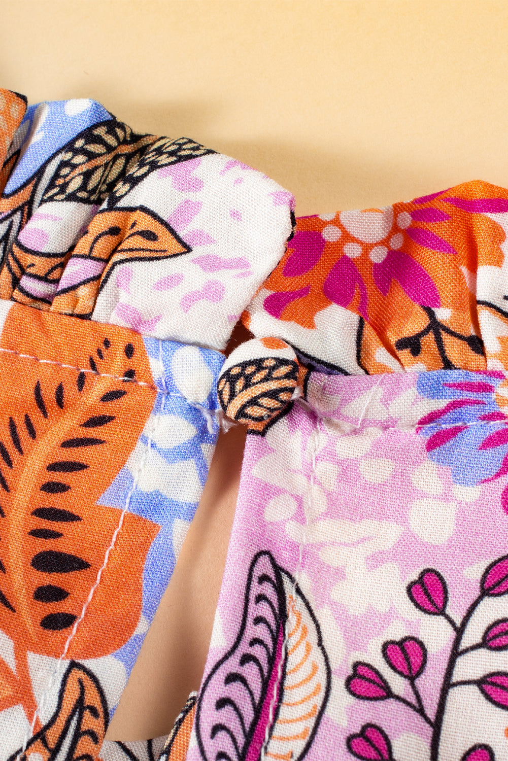 Multicolour floral bishop sleeve blouse with frilled round neck from ModestAndDevoted, made of soft viscose fabric.