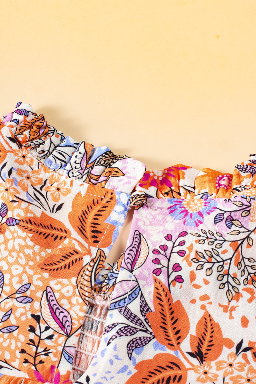 Multicolour floral bishop sleeve blouse by ModestAndDevoted with frilled round neck and 100% viscose fabric.