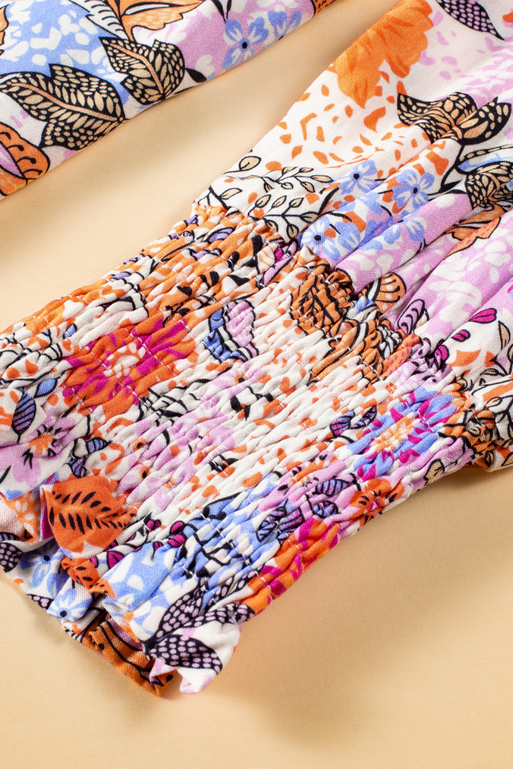 Multicolour floral bishop sleeve blouse from ModestAndDevoted with frilled round neck and 100% viscose fabric.