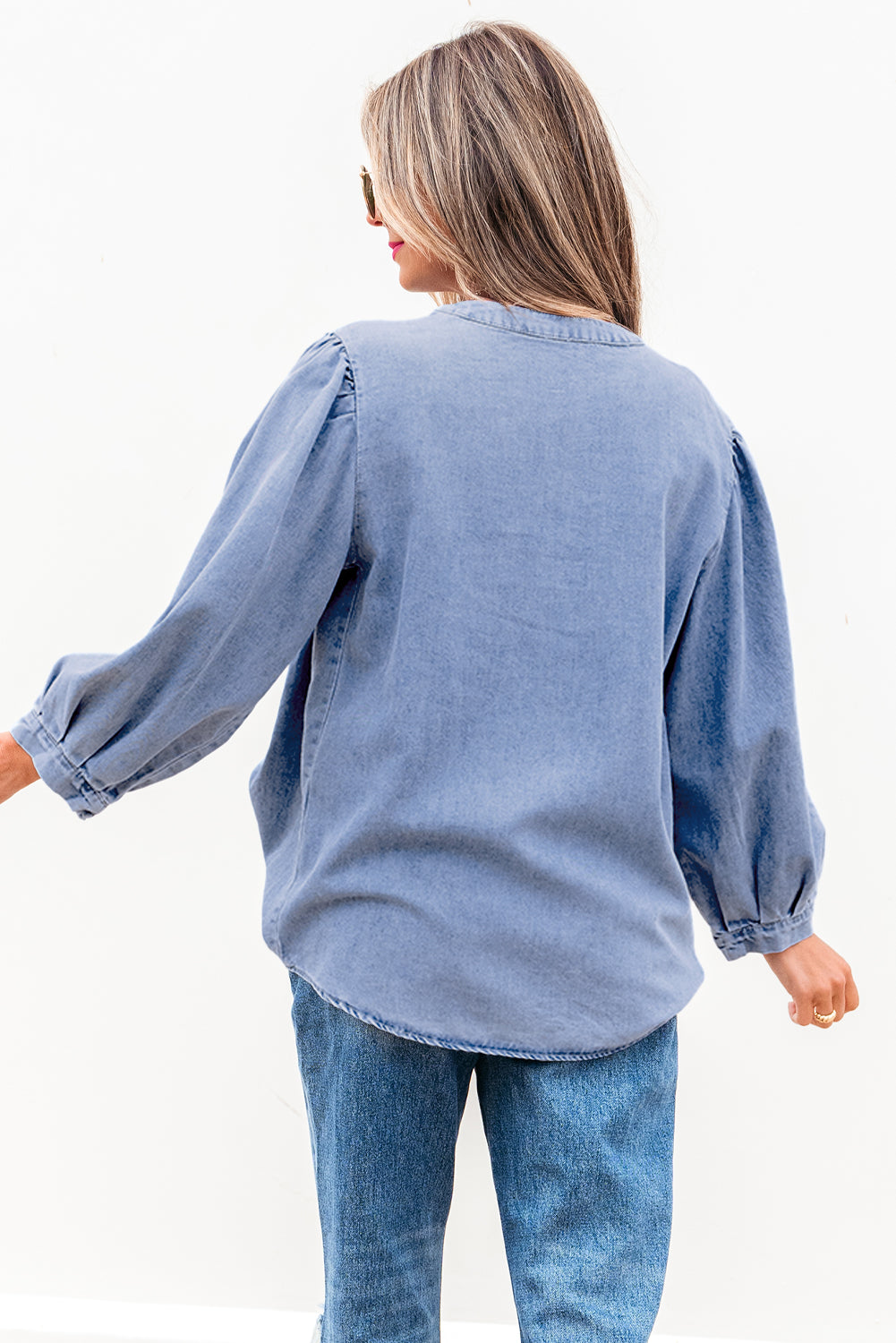 Myosotis denim puff sleeve top with front pintuck and bow tie detail, made from cotton-polyester blend, by ModestAndDevoted.