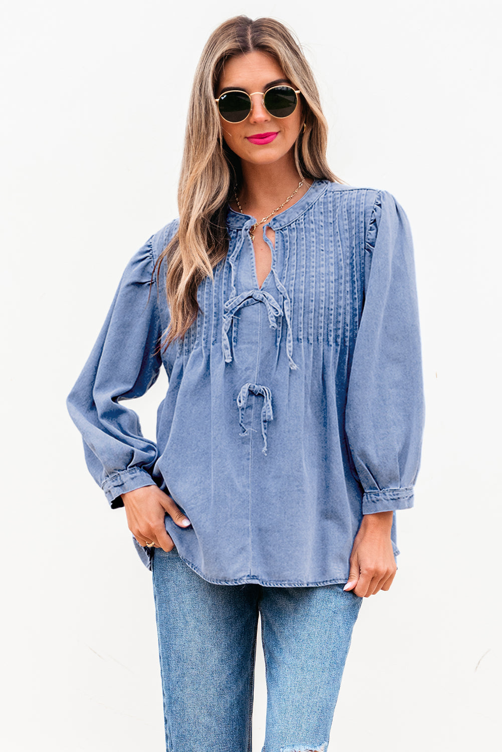 Myosotis denim puff sleeve top with front pintuck and bow tie detail, made of cotton-polyester blend, from ModestAndDevoted.