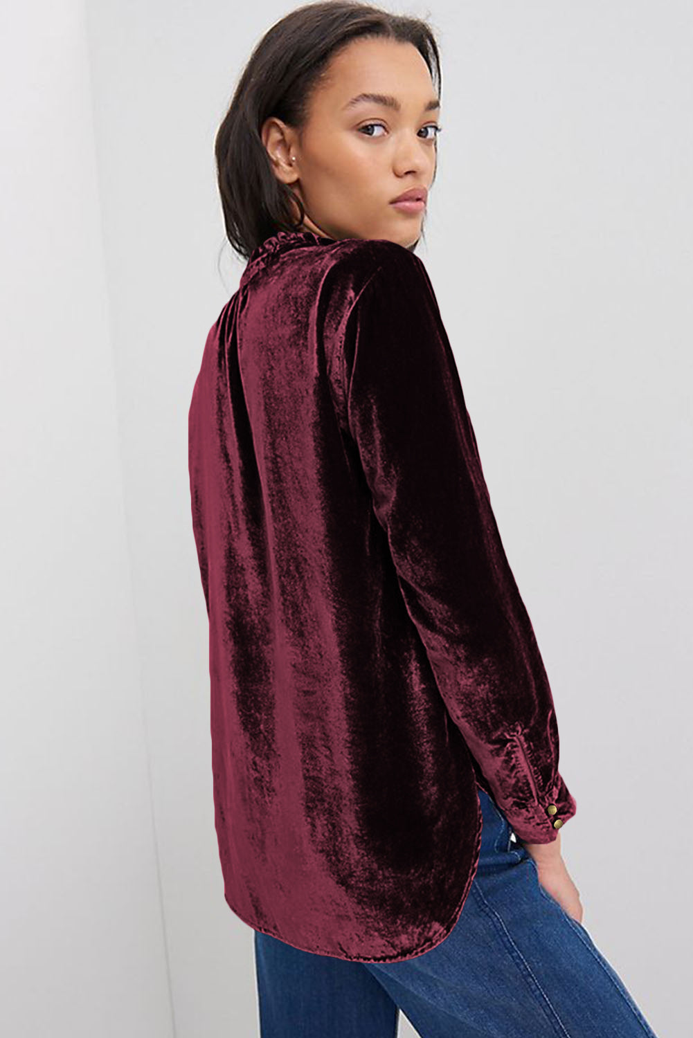 Navy blue velvet top with frilled neckline and button front, made by ModestAndDevoted, featuring a stylish and elegant design.