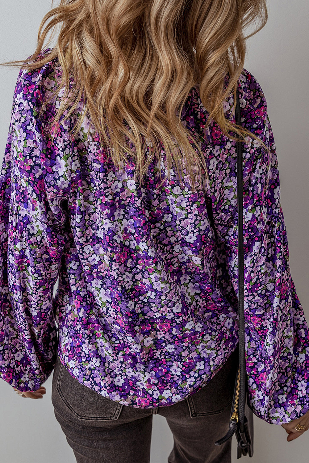 Purple boho flower split V-neck blouse with bubble sleeves by ModestAndDevoted, made of polyester, stylish and feminine.