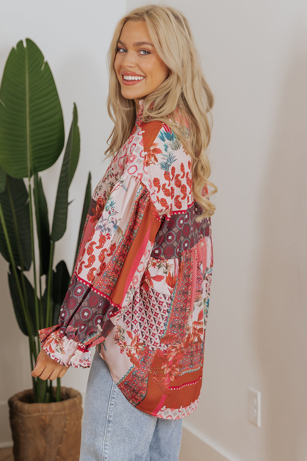 Red boho geometric patchwork blouse with bubble sleeves, from ModestAndDevoted, made of polyester, featuring mixed prints and vibrant style.