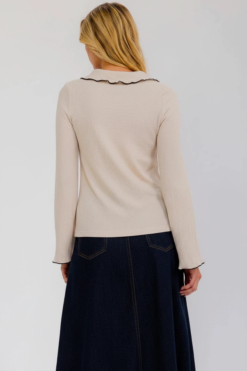Beige women's long sleeve button-up blouse with trim collar, from ModestAndDevoted, featuring classic design and tailored fit.