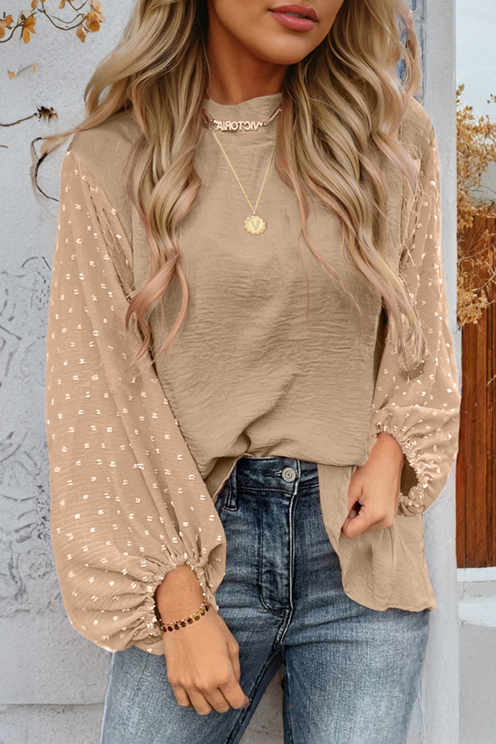 ModestAndDevoted Swiss Dot Balloon Sleeve Loose Blouse, lightweight polyester top with a relaxed fit and delicate dot pattern.