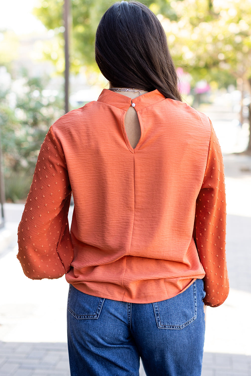 ModestAndDevoted Swiss Dot Balloon Sleeve Loose Blouse, lightweight polyester top with puffed sleeves and a relaxed fit.