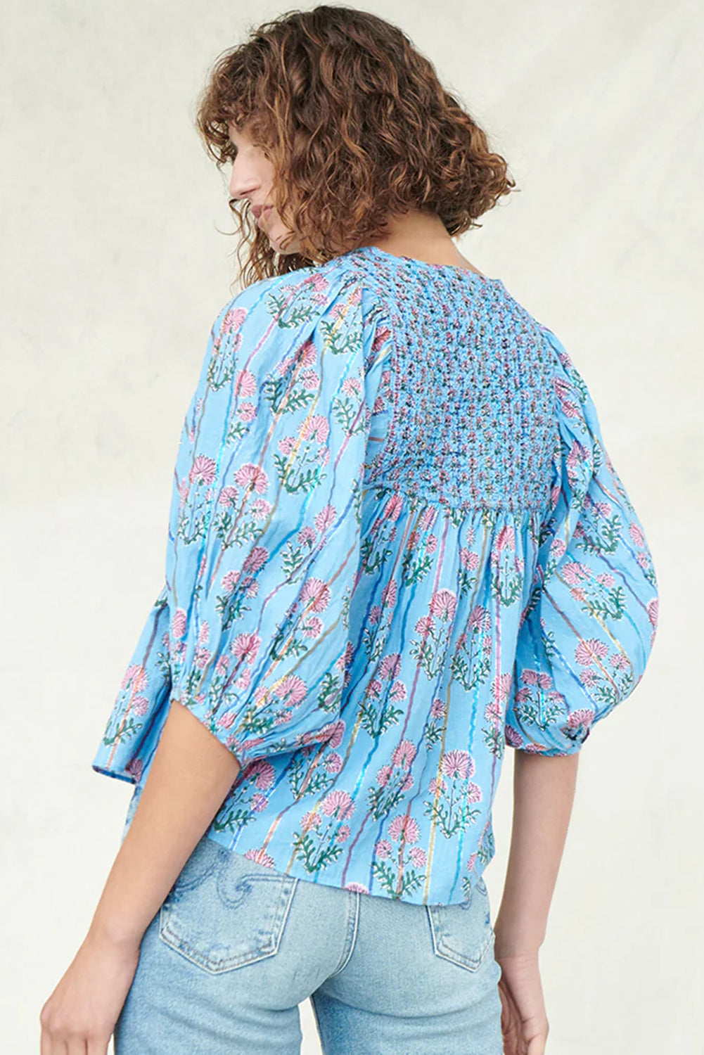 Sky blue floral striped print blouse with shirred yoke and split neck, made by ModestAndDevoted, perfect for casual or office wear.