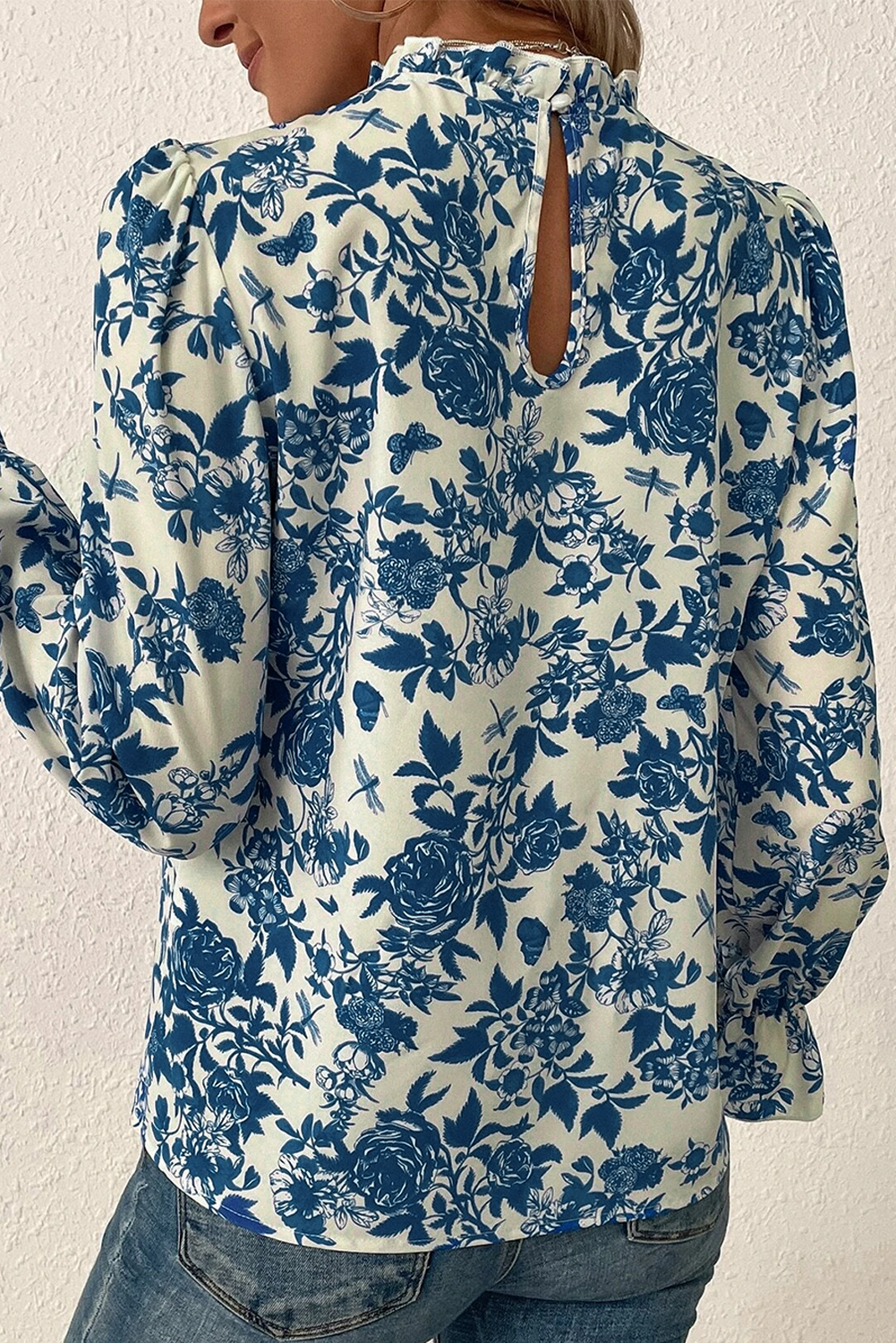 Sky blue floral print blouse with flounce sleeves and keyhole back, from ModestAndDevoted, stylish tops and blouses collection.