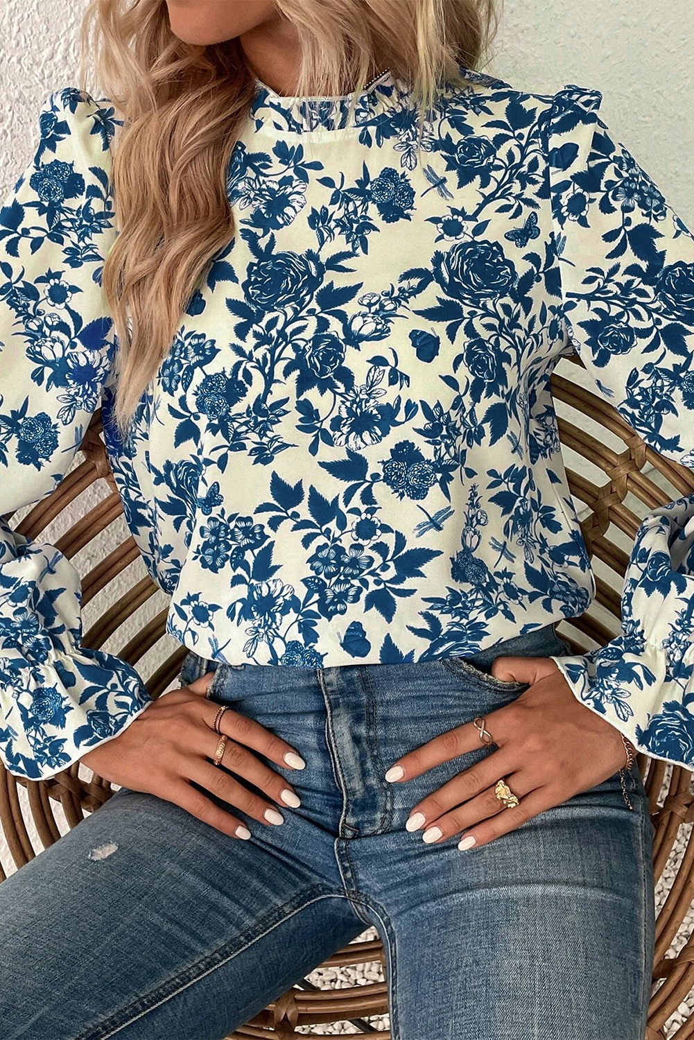 Sky blue floral print blouse with flounce sleeves and keyhole back, from ModestAndDevoted, designed for stylish tops and blouses.