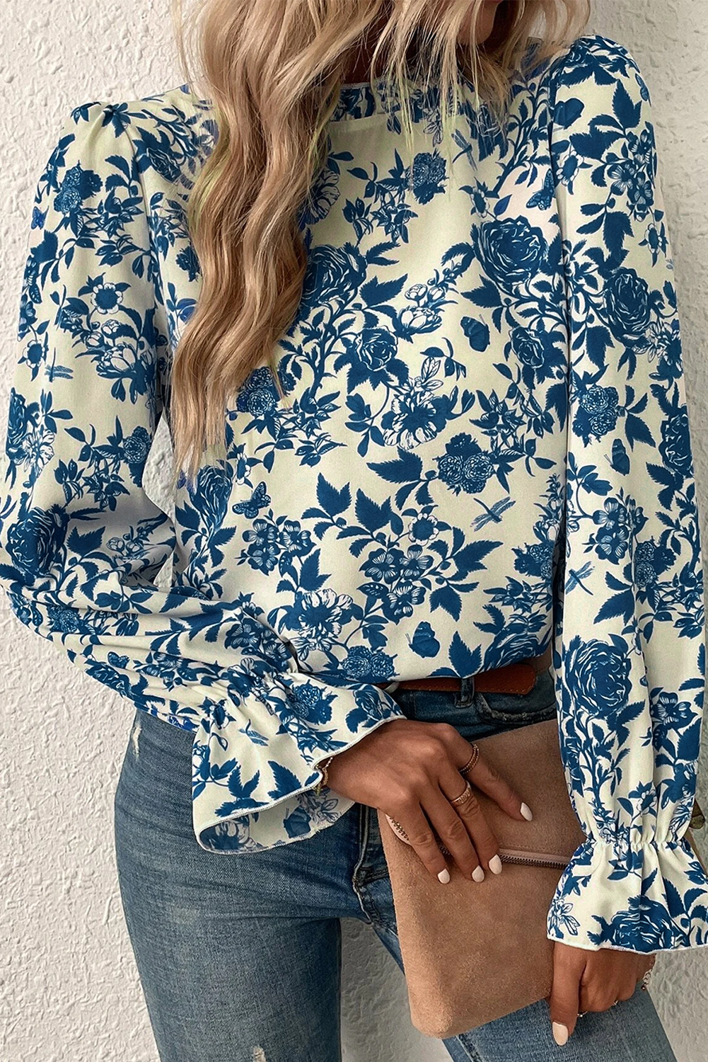 Sky blue floral print blouse with flounce sleeves and keyhole back, from ModestAndDevoted, designed for stylish tops and blouses.