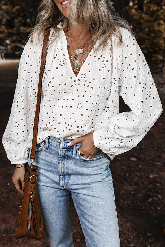White eyelet embroidered puff sleeve V-neck blouse from ModestAndDevoted, featuring cotton fabric and feminine detailing.