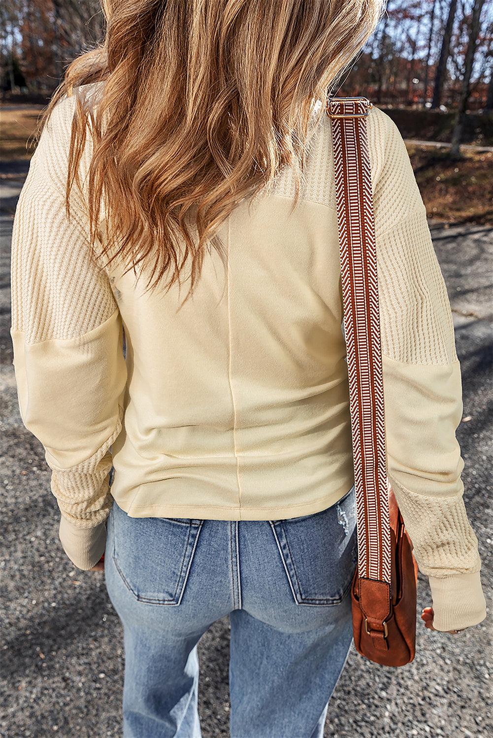 Beige thermal knit patchwork long sleeve top by ModestAndDevoted with exposed seams, made of cotton, polyester, and elastane.