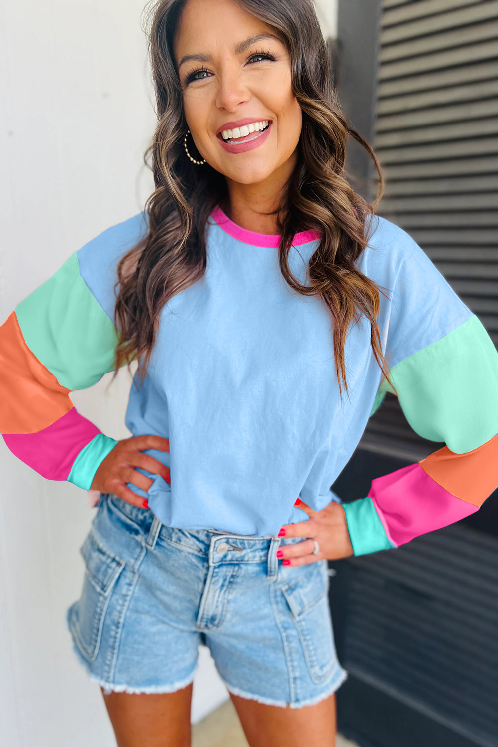 Dark blue colorblock patchwork long sleeve loose top by ModestAndDevoted, featuring a casual, relaxed fit with contrasting fabric panels.