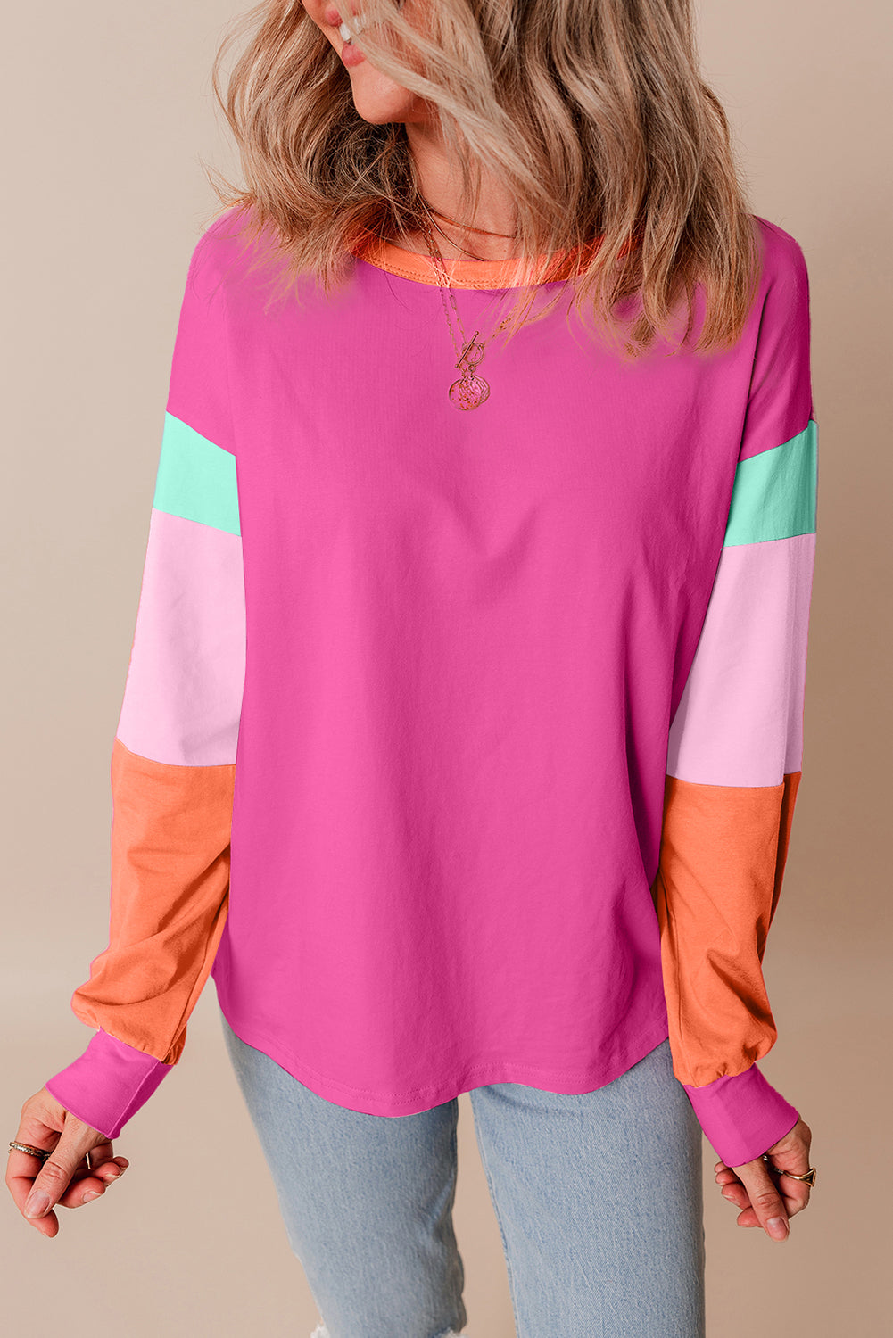 Dark blue colorblock patchwork long sleeve loose top by ModestAndDevoted, featuring a casual, relaxed fit with contrasting fabric panels.